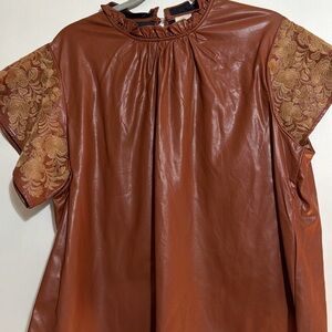 Chic Leather Blouse with Embroidered Sleeves